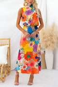 Naila | Vestido maxi floral sin mangas con lazo en el cuello y la cintura