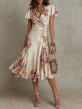 Joanna | Vestido midi satinado con flores de estilo vintage